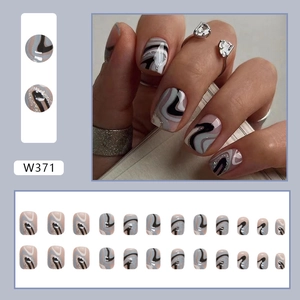 Short round press-on nails with marble texture and silver glitter accents, set of 24 pieces