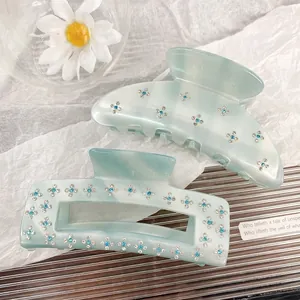 Exquisite sky blue acetate hair claw set with rhinestones and marble texture for women