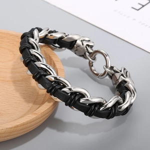 Men's trendy braided skull bracelet featuring stainless steel chains and black leather
