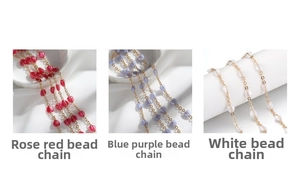 Detail of heart bead chains in rose pink, blue-violet, and white for DIY jewelry making