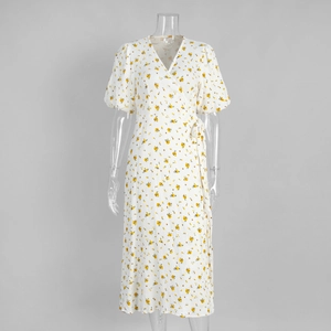 Detail of floral wrap dress featuring V-neckline and adjustable side waist tie
