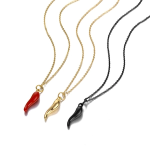 Three Italian horn necklaces in red, gold, and black with polished stainless steel chains