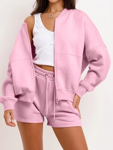Pink casual two-piece lounge set with hooded zip-up jacket and drawstring shorts