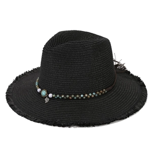 Women's black straw Panama sun hat with colorful beaded band and silver leaf pendant