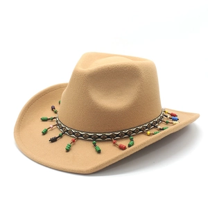 Close-up of beige western felt hat with colorful beads and geometric woven band