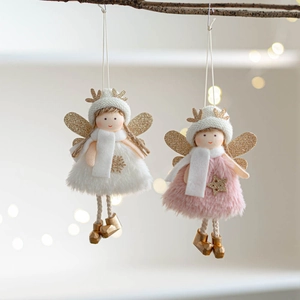 Close-up of pink and white plush Christmas angel dolls with gold antlers and wings