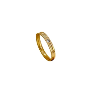 Minimalist gold titanium steel ring with a single round zircon and brushed metal finish