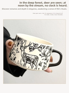 Detail view of a vintage ceramic mug featuring retro deer and floral illustrations