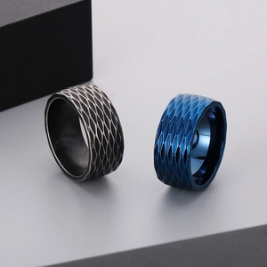 Detailed close-up of 10mm wide ring featuring diamond texture and vintage finish