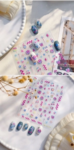 Detailed Y2K style nail stickers featuring holographic stars, hearts, and cherry patterns