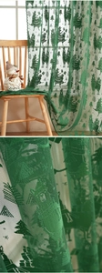 Detailed lace mesh with festive alpaca pattern and scalloped edges for holiday curtains