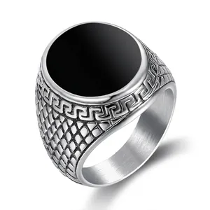 Vintage stainless steel ring for men with black round dome and Greek key patterns