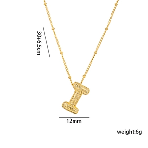 Detail view of gold letter I pendant with micro-pave cubic zirconia and size dimensions