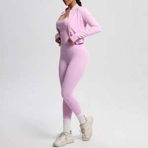 Three-piece pink yoga set with high-waist leggings, camisole, and zipper jacket