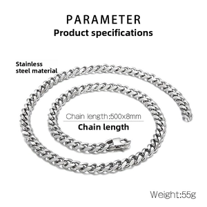 Macro detail of 8mm wide stainless steel Cuban chain necklace with lobster clasp closure