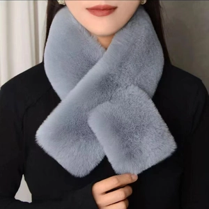 Detail of grey faux mink fur scarf showing the plush texture and stylish crossover wear