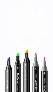 Detailed view of dual-tip markers with broad and fine nibs for professional art and design