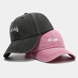 Matching vintage washed cotton baseball caps with mama and daddy heart embroidery
