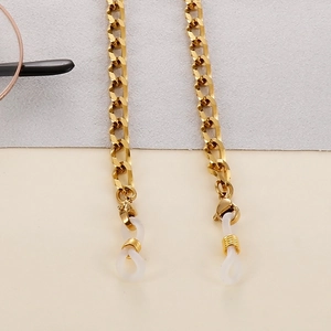 Close-up of golden geometric glasses chain with lobster clasp and white anti-slip loops