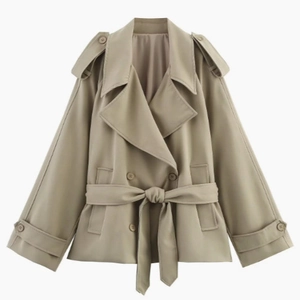 Women's khaki short trench coat with lapels, double-breasted buttons, and adjustable waist belt