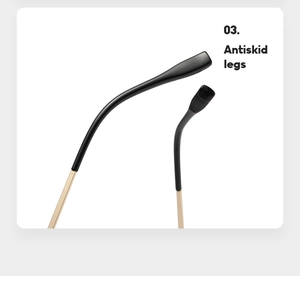Detail of black anti-slip ear pads on gold metal temple arms for cat-eye sunglasses