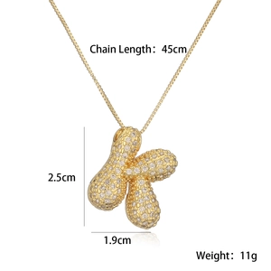 Detail view of 45cm gold necklace with peanut pendant size 2.5cm and 11g weight