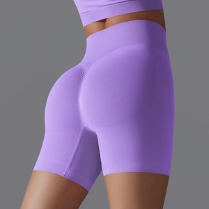 Detail view of purple seamless yoga shorts featuring high waist and scrunch butt design