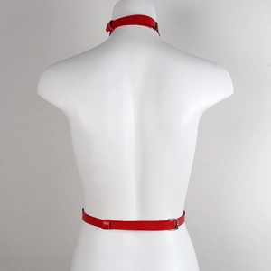 Red faux leather restraint set with neck collar and waist belt detail on mannequin