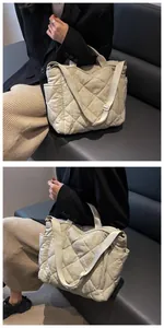 Quilted beige tote bag showing both hand-carry and shoulder strap styles for daily commute