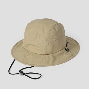 Detail of khaki hiking hat showing quick-dry nylon fabric and adjustable chin strap
