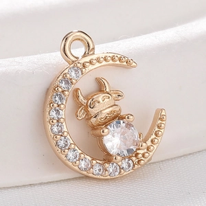 Golden moon pendant with cartoon cow and cubic zirconia inlay for jewelry making