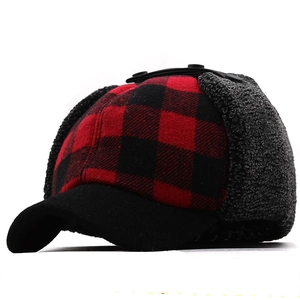 Winter buffalo plaid trapper hat with ear flaps and warm fleece lining for cold weather