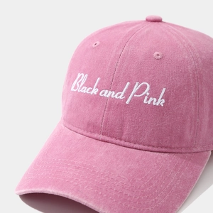 Pink washed cotton baseball cap with Black and Pink embroidery and vintage aesthetic