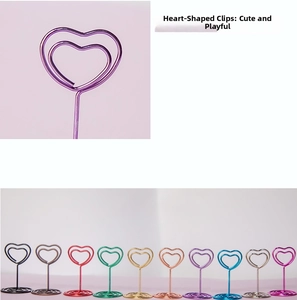 Macro shot of double heart metal photo clips in various vibrant electroplated colors