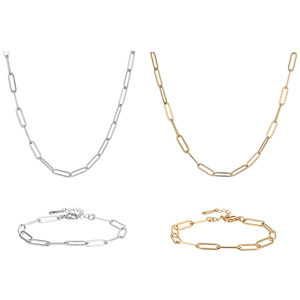 Gold and silver stainless steel paperclip chain necklace and bracelet sets on white background