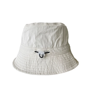 Women's quick-dry nylon bucket hat with adjustable elastic drawstring in cream color