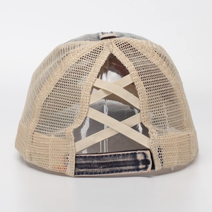 Detail of cross elastic bands on denim baseball cap for high ponytail hairstyles