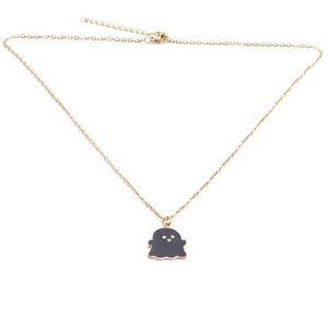 Detail view of a gold chain necklace featuring a black ghost enamel pendant for Halloween