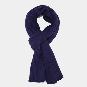 Detail showing the deep purple ribbed knit texture of this warm winter scarf