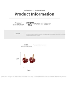 Detail of red heart drop earrings showing 3cm by 2cm dimensions and copper material info