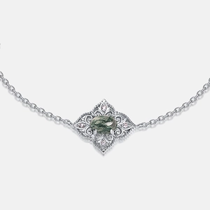 Squisito bracciale in argento S925 con agata muschiata ovale e delicati motivi a nido