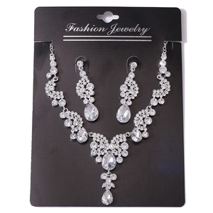 Elegant bridal crystal necklace and earring set with pear-shaped stones for evening dresses