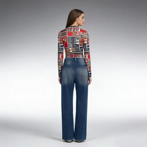 Rear view of high-waisted wide-leg denim jeans with patchwork print long sleeve top