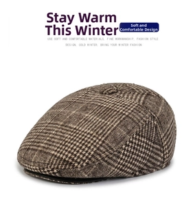 Detailed texture of a classic brown plaid ivy cap made of warm winter tweed fabric