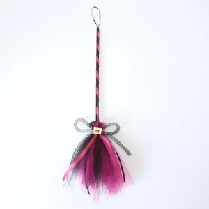 Pink and black striped witch broom with mesh mesh head and silver sequin bow detail