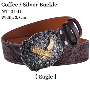 Detail of coffee leather belt with eagle embossed silver buckle and 3.8cm width