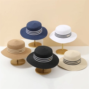 Wide brim woven straw sun hat for women in five colors with striped band and metal logo