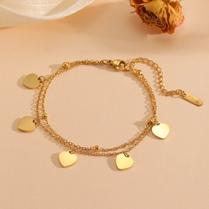 Double-layer stainless steel heart bracelet in gold finish with small beads