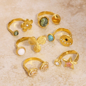 6-piece gold stainless steel ring set with natural stone, flower and leaf charms