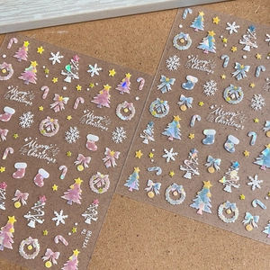Laser Christmas nail art stickers featuring snowflake and tree patterns for holiday DIY manicure